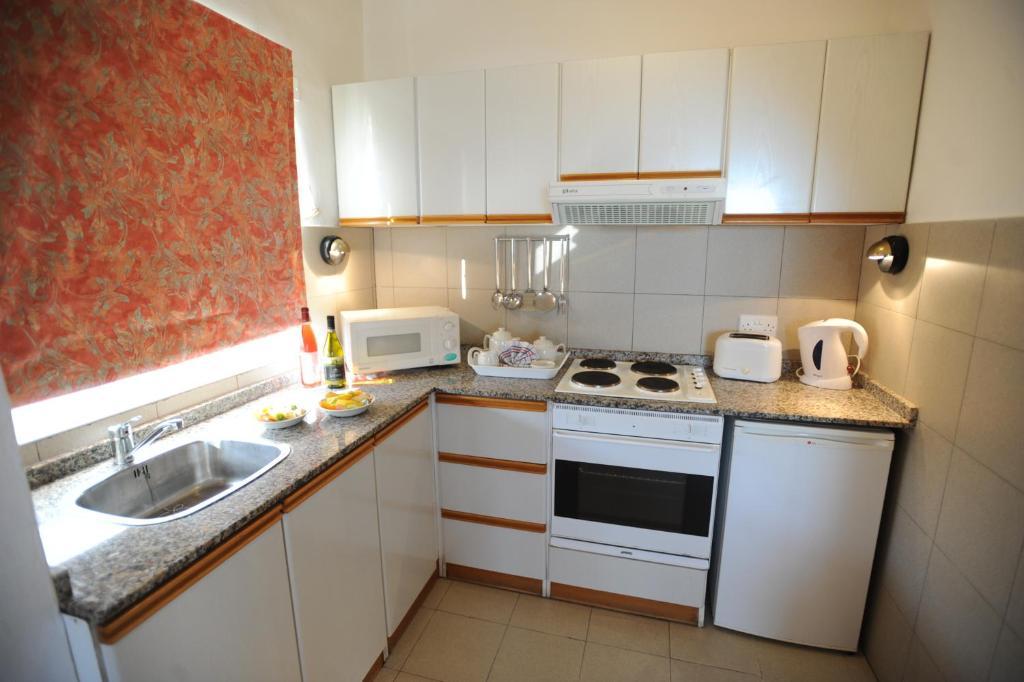 Aparthotel Club Salina Wharf Qawra Habitación foto