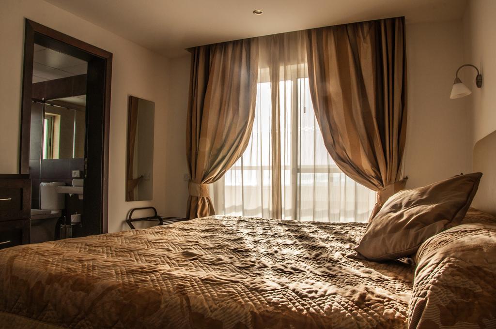 Aparthotel Club Salina Wharf Qawra Habitación foto
